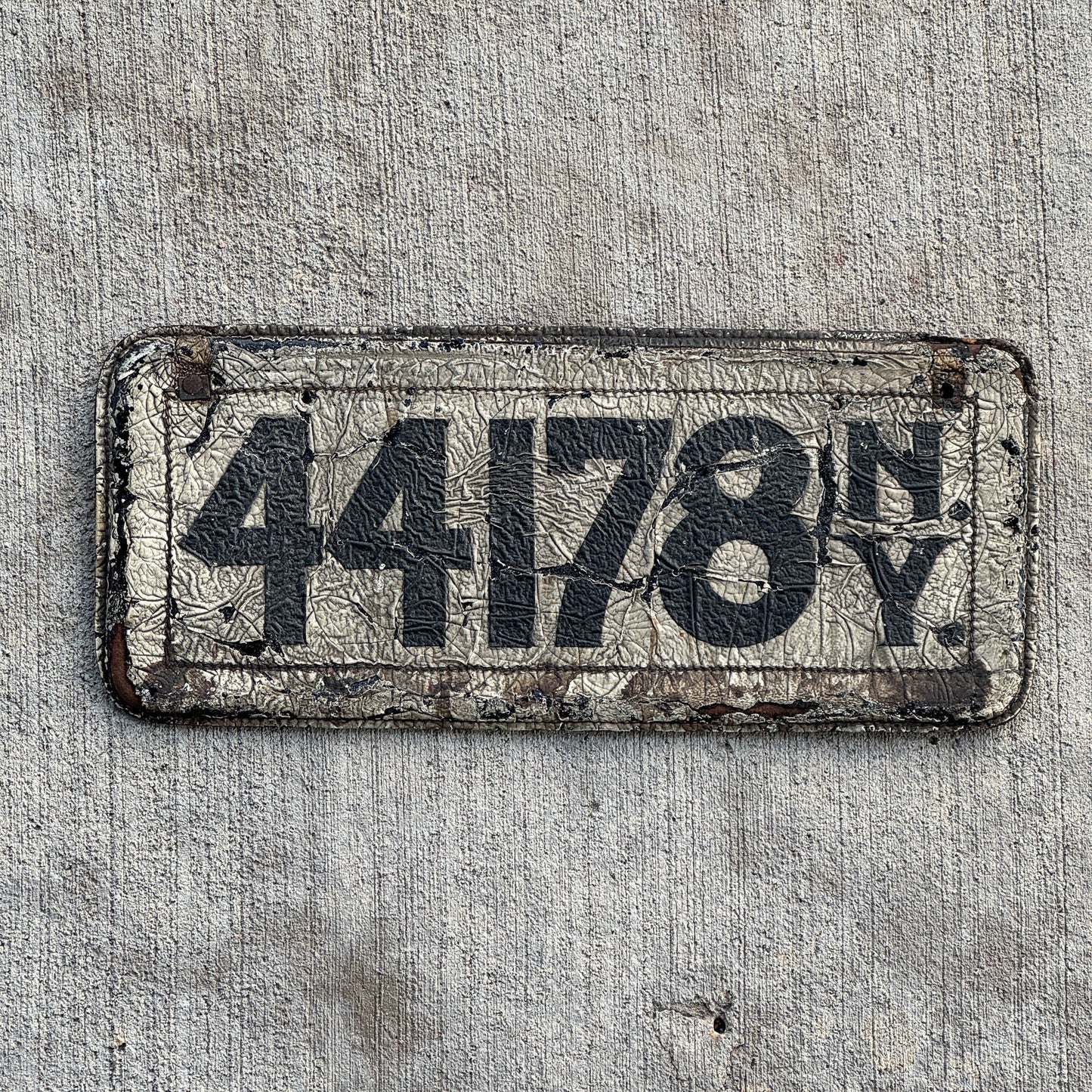 Photo of a 1907 New York Leather Prestate License Plate Auto Tag Garage Decor Vintage 44178 with original patina
