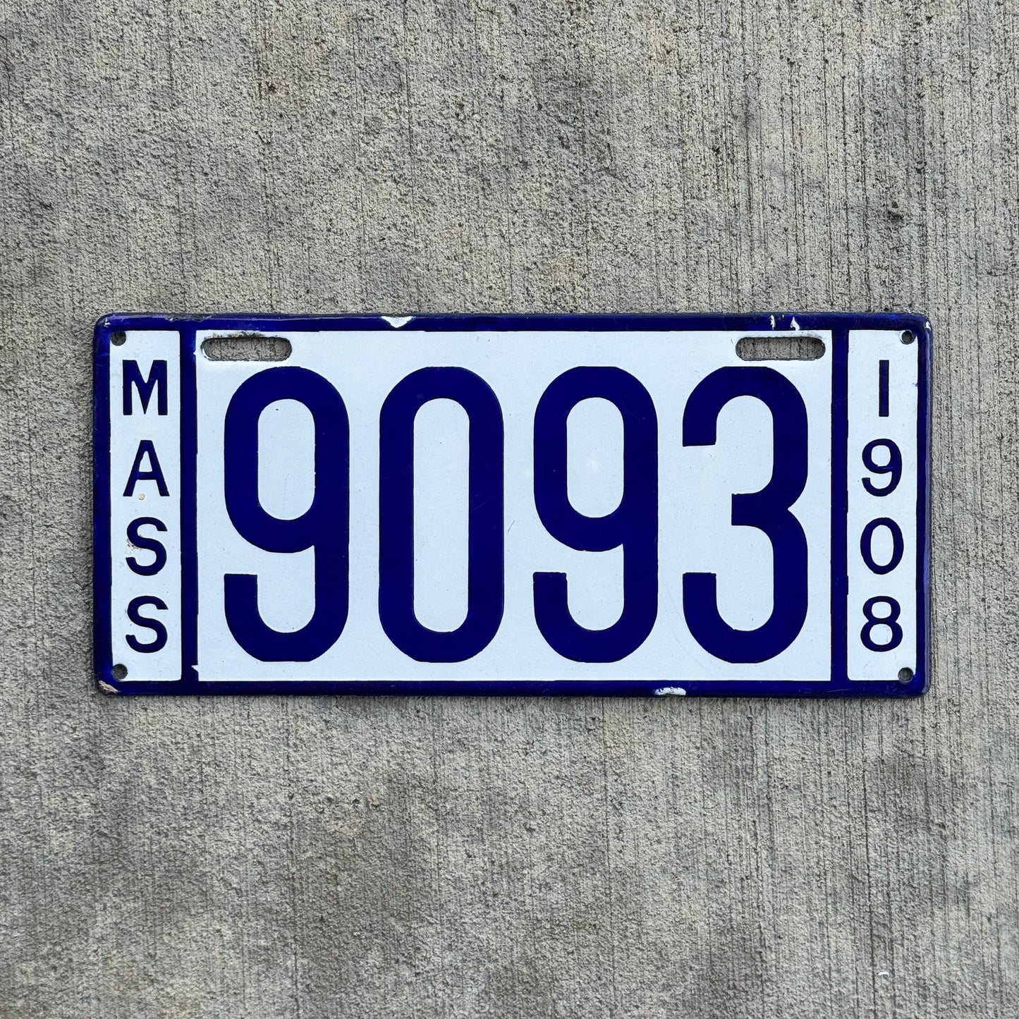 Photo of a 1908 Massachusetts Porcelain License Plate Auto Tag 2 Vintage Garage Low Number Four Digit High Quality 9093 with original patina