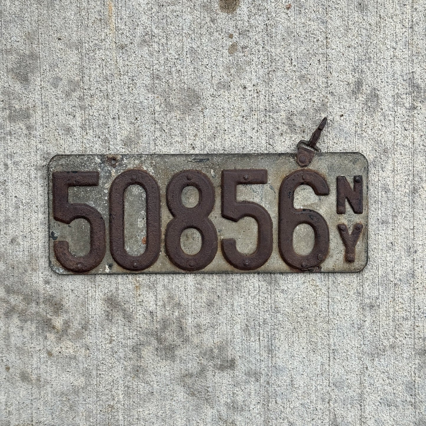 Photo of a 1908 New York Prestate License Plate Auto Tag Garage Decor Vintage Early 50856 with original patina
