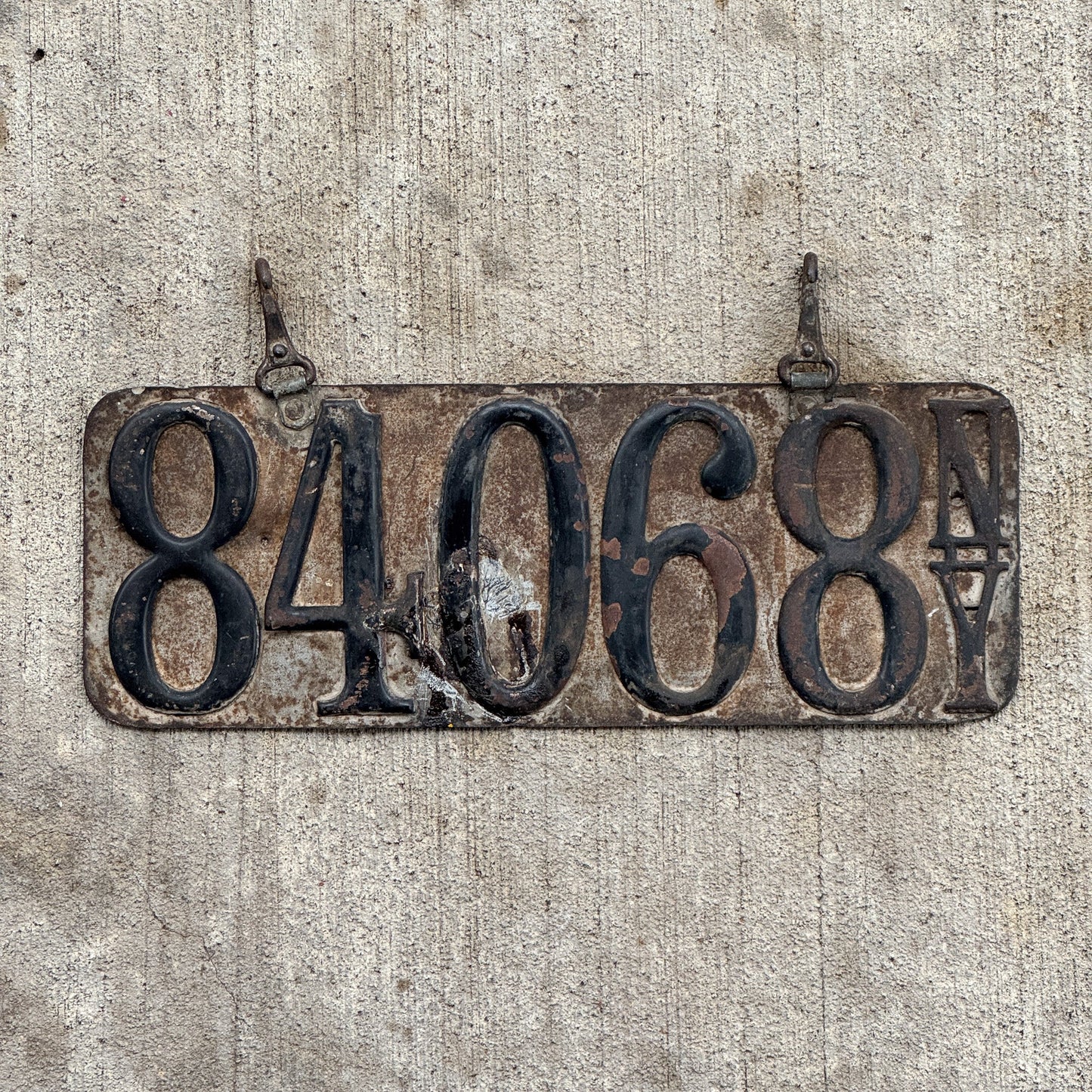 Photo of a 1909 New York Prestate License Plate Auto Tag Garage Decor Vintage Early 84068 with original patina