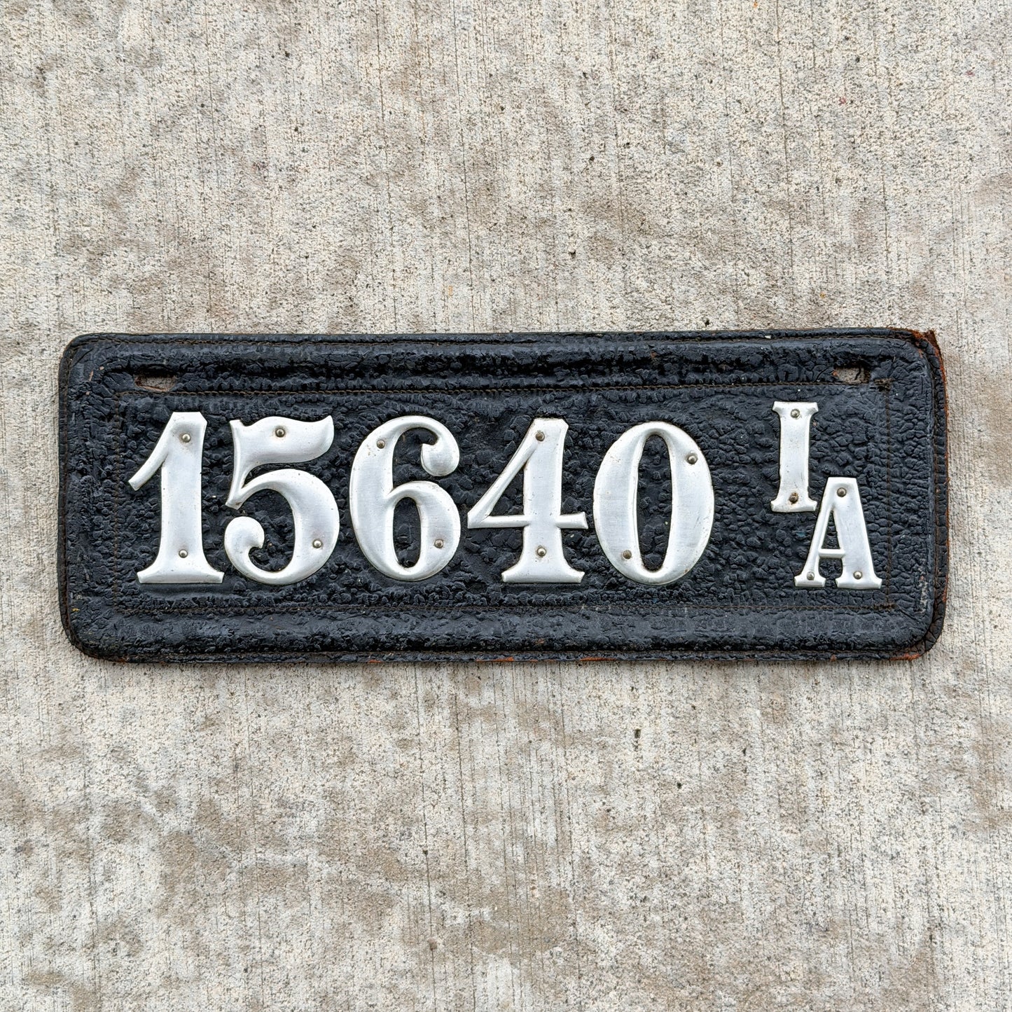 Photo of a 1910 Iowa Prestate License Plate Auto Tag Garage Decor Vintage 15640 with original patina