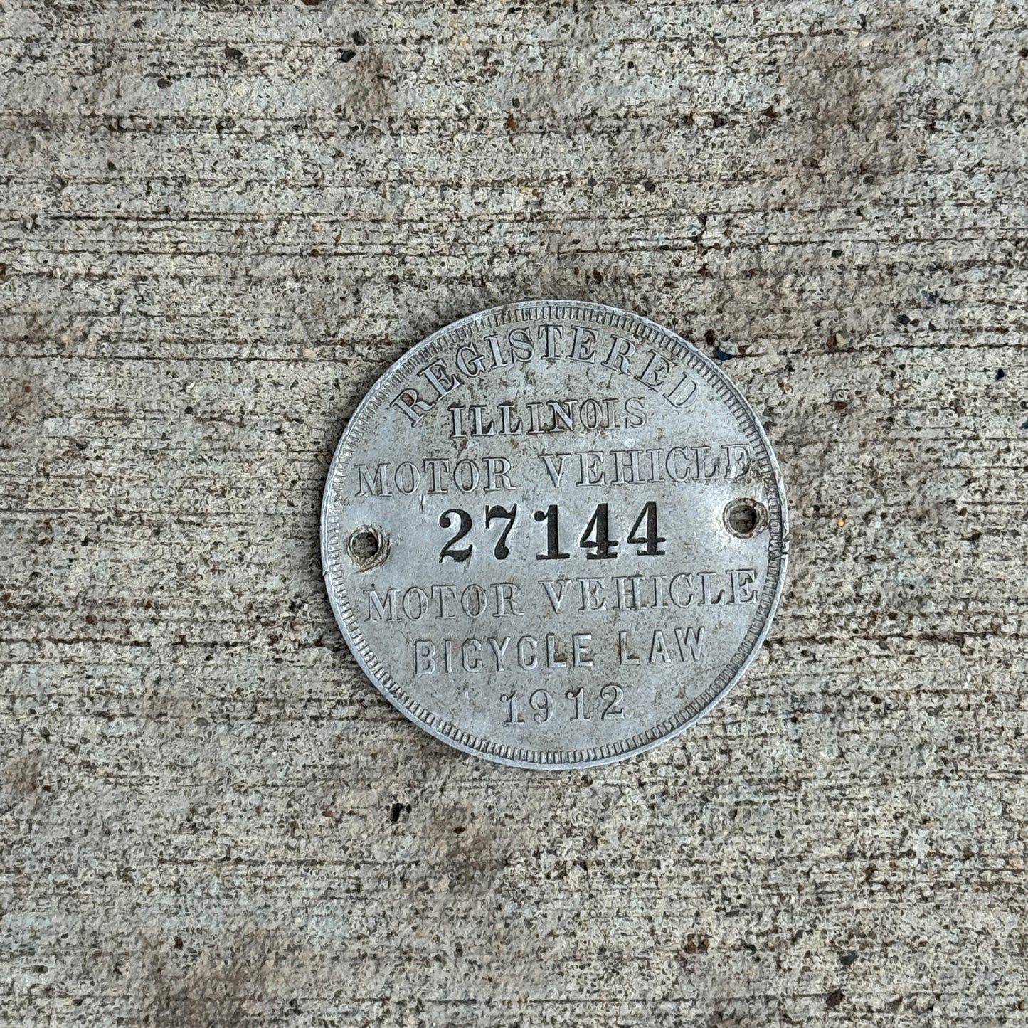 Photo of a 1912 Illinois Dashboard Disc License Plate Auto Tag Garage Decor Vintage Dash Disk 27144 with original patina