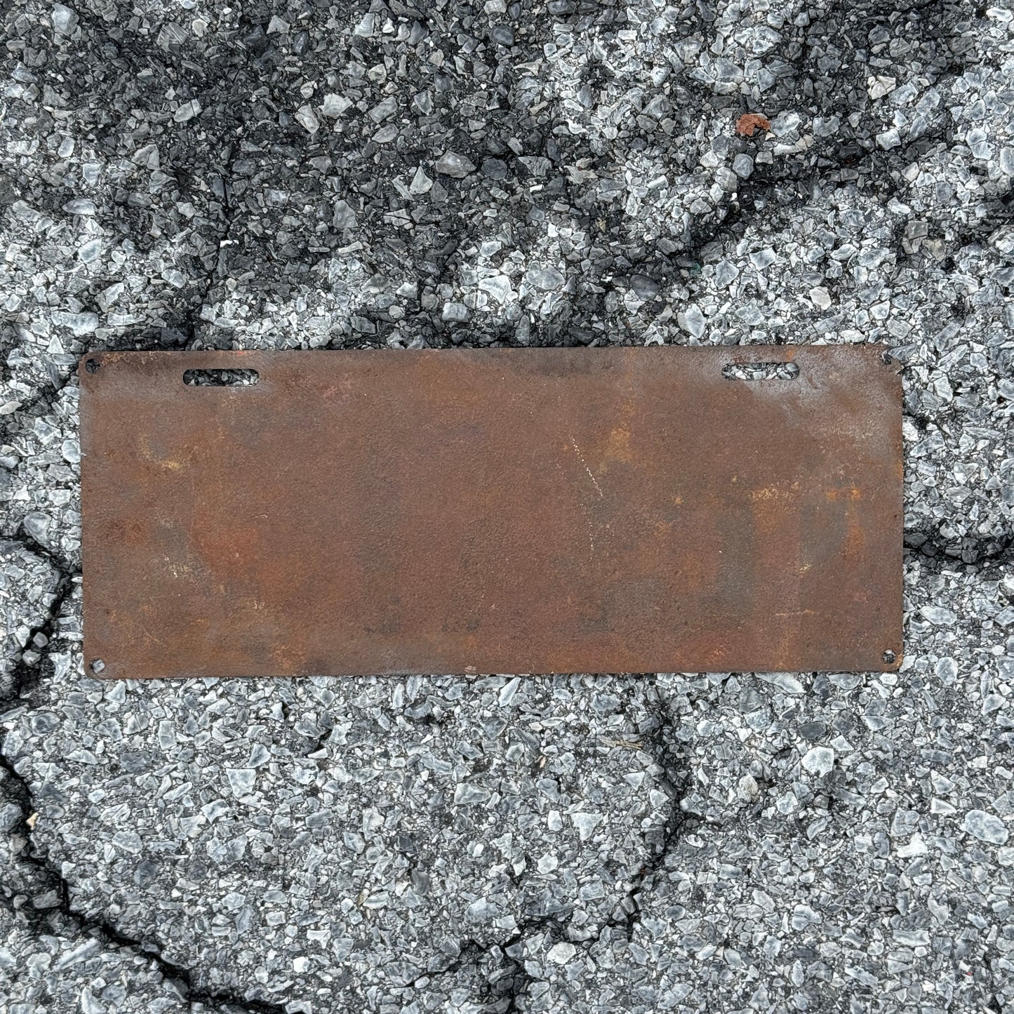 Photo of a rusty 1912? Ohio License Plate Auto Tag 162 _ _