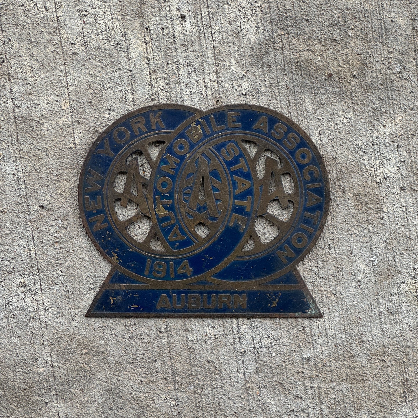 Photo of a 1914 Auburn New York Badge Emblem License Plate Topper Auto Tag Garage Decor Vintage AAA Auto Club with original patina