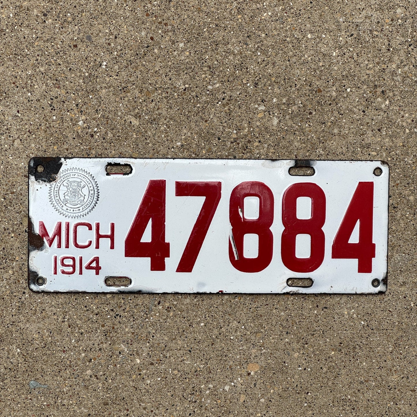 Photo of a 1914 Michigan Porcelain License Plate Auto Tag Garage Decor Vintage 47884