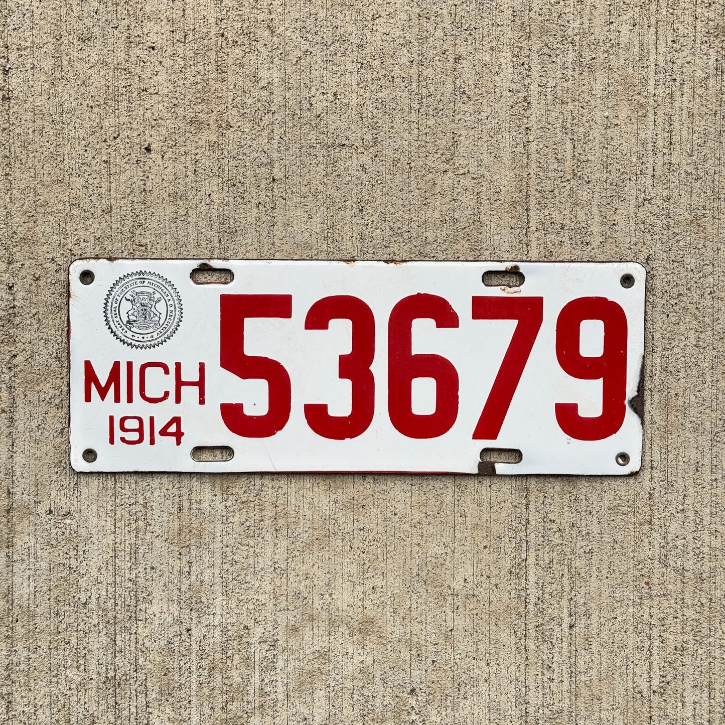 Photo of a 1914 Michigan Porcelain License Plate Auto Tag Garage Decor Vintage High Quality 53679 with original patina
