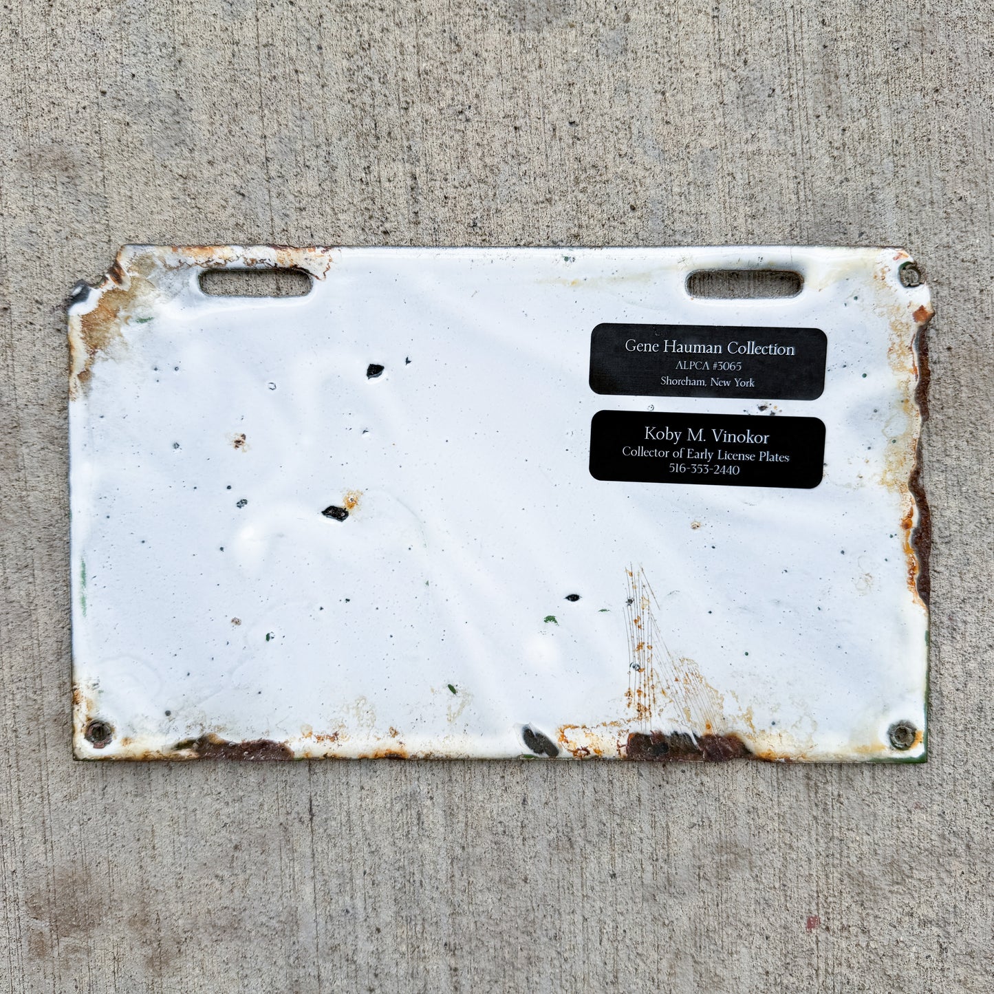 Photo of a 1914 New Brunswick Porcelain Dealer License Plate Auto Tag Garage Decor Vintage High Quality Low Number Two Digit 67 with original patina