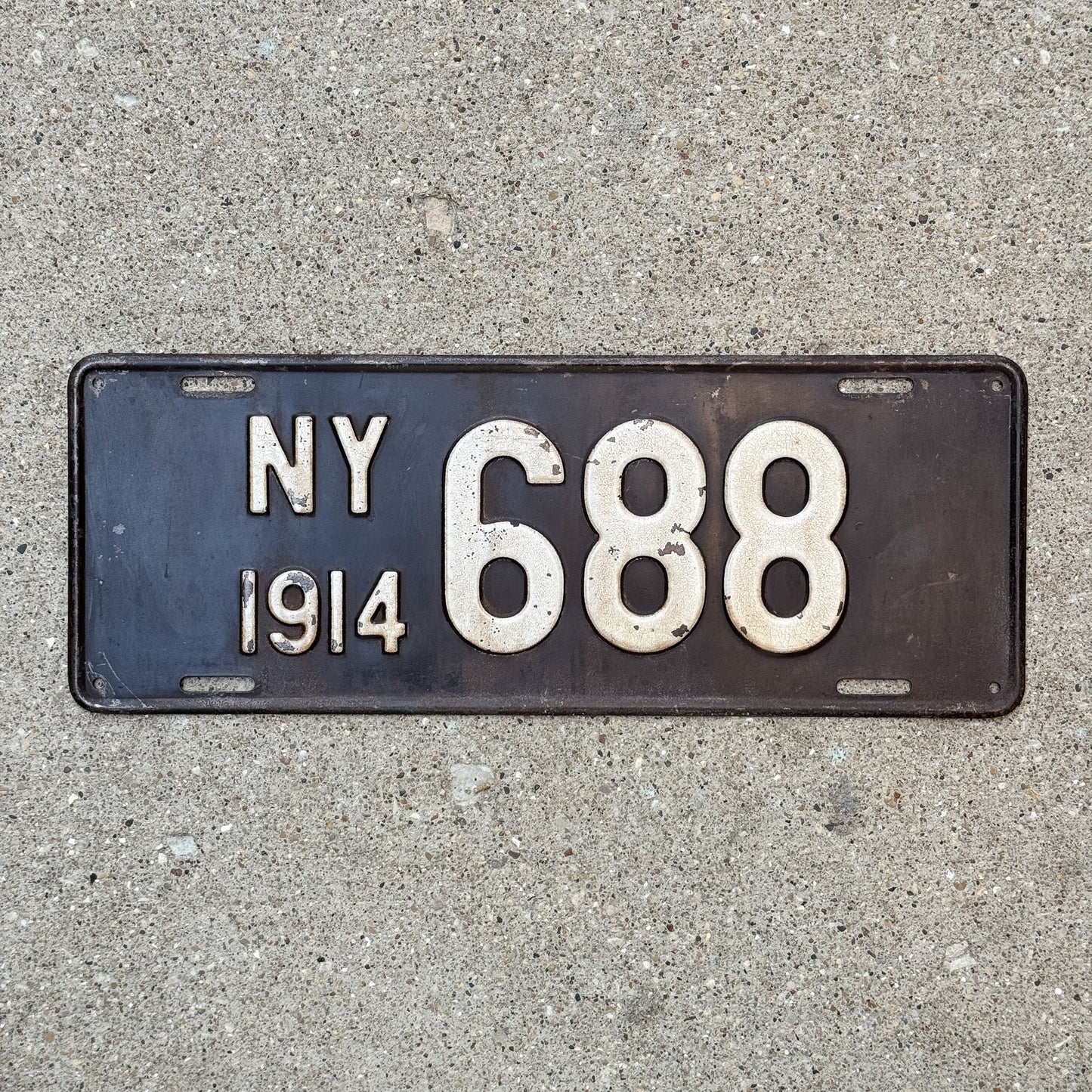 Photo of a 1914 New York Reserved Passenger License Plate Auto Tag Garage Decor Vintage ALPCA Archive Example Low Number Three Digit 688 with original patina
