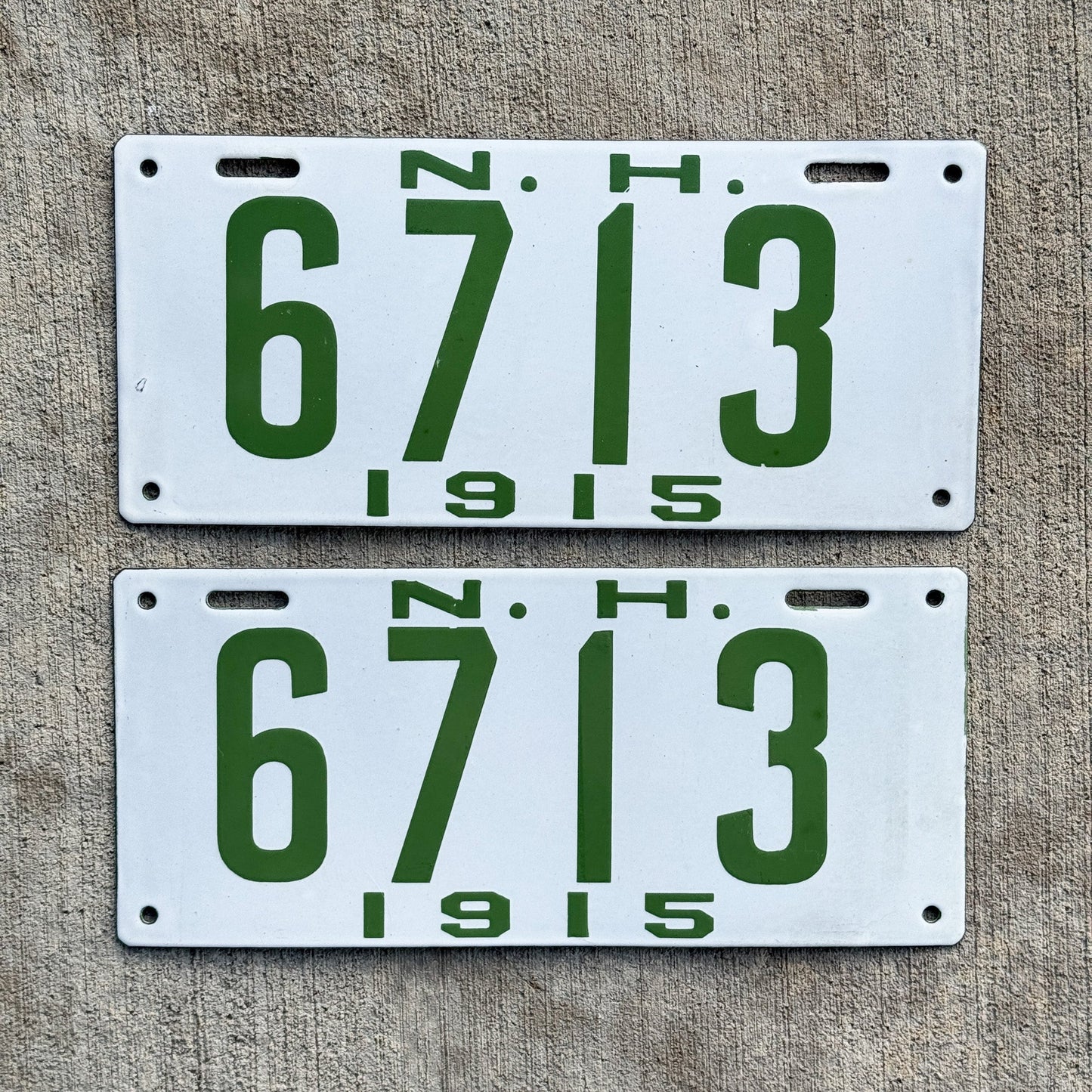 Photo of a 1915 New Hampshire Porcelain License Plate Pair Auto Tag Garage Decor Vintage Low Number Four Digit High Quality 6713 with original patina