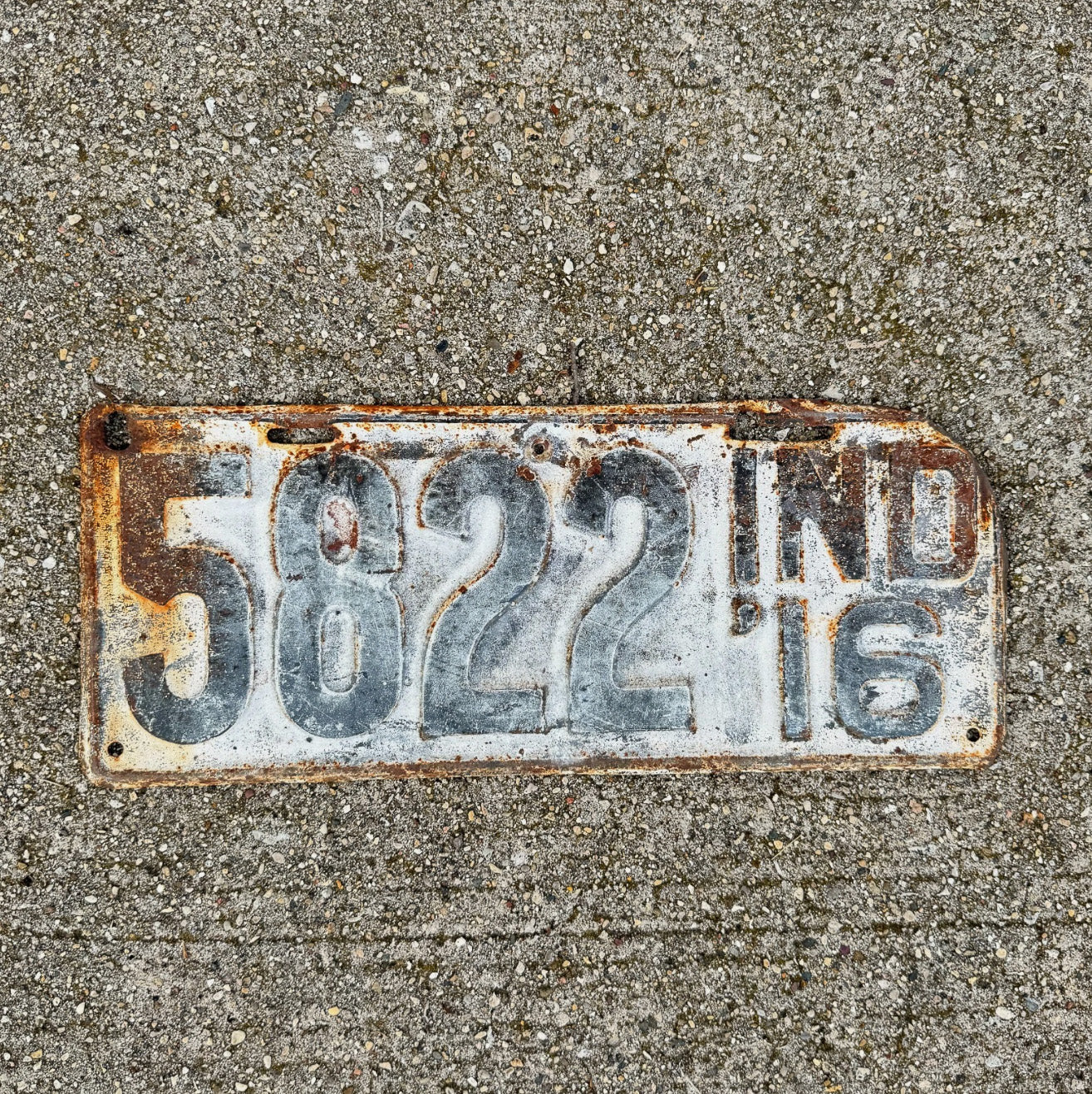 Photo of a 1916 Indiana License Plate Auto Tag Garage Decor Vintage Low Number Four Digit 5822 with original patina