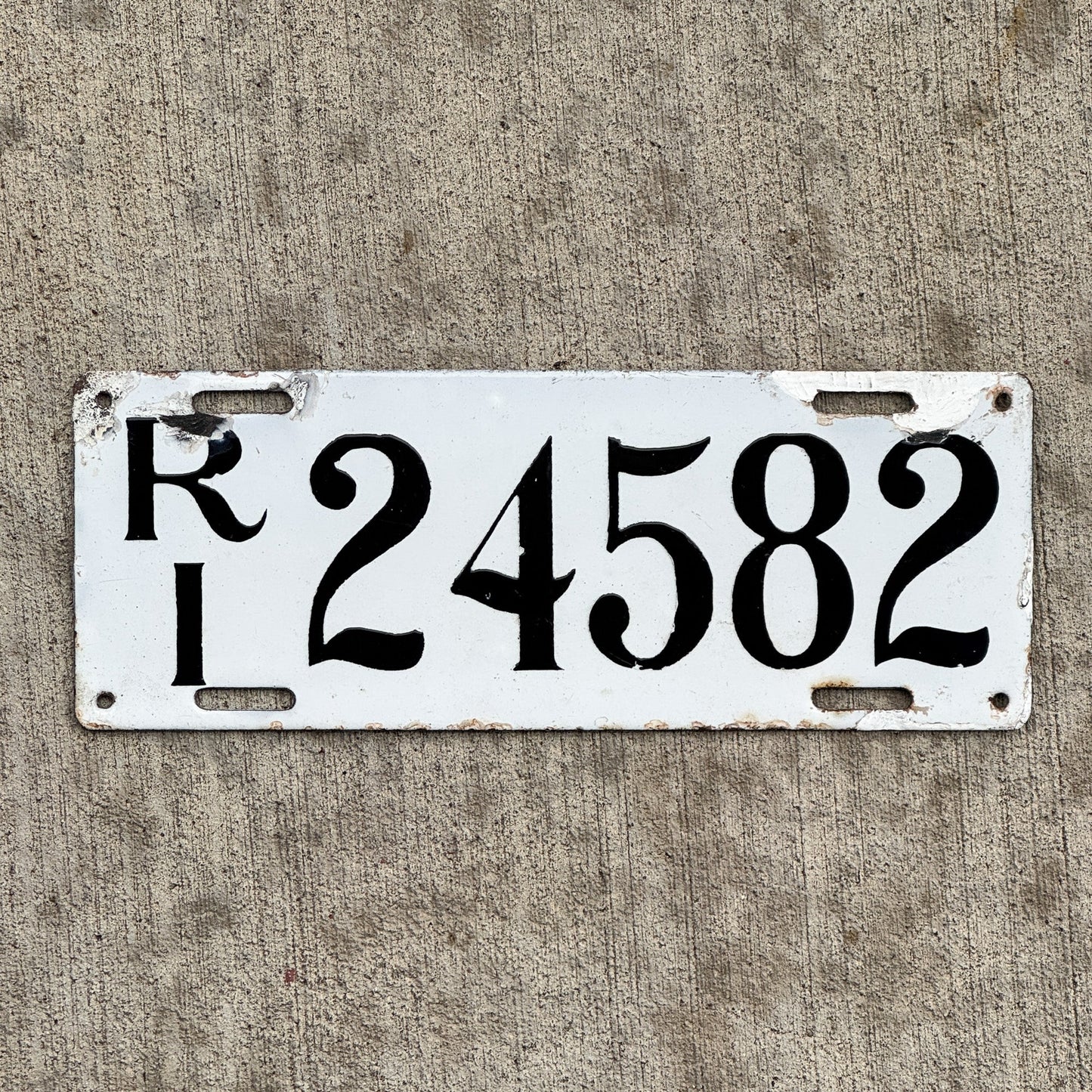 Photo of a 1916 Rhode Island Porcelain License Plate Auto Tag Garage Decor Vintage 24582 with original patina