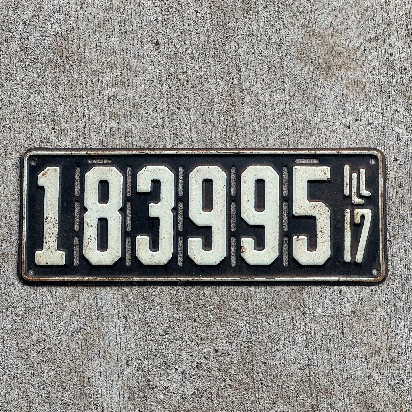 Photo of a 1917 Illinois License Plate Auto Tag Garage Decor Vintage 183 995 with original patina