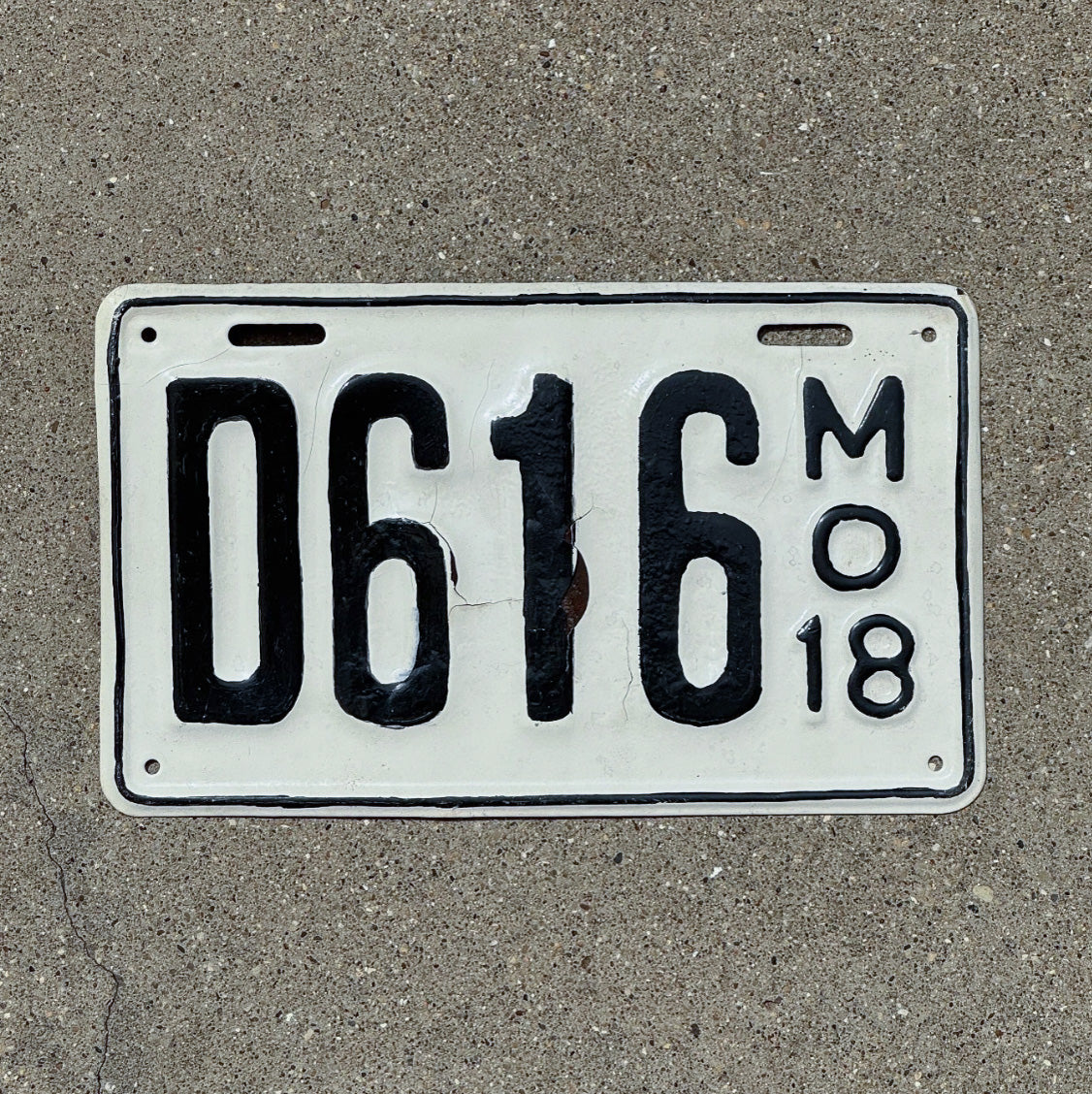 Photo of a 1918 Missouri Dealer License Plate Auto Tag Garage Decor Vintage Low Number Three Digit D 616 with original patina