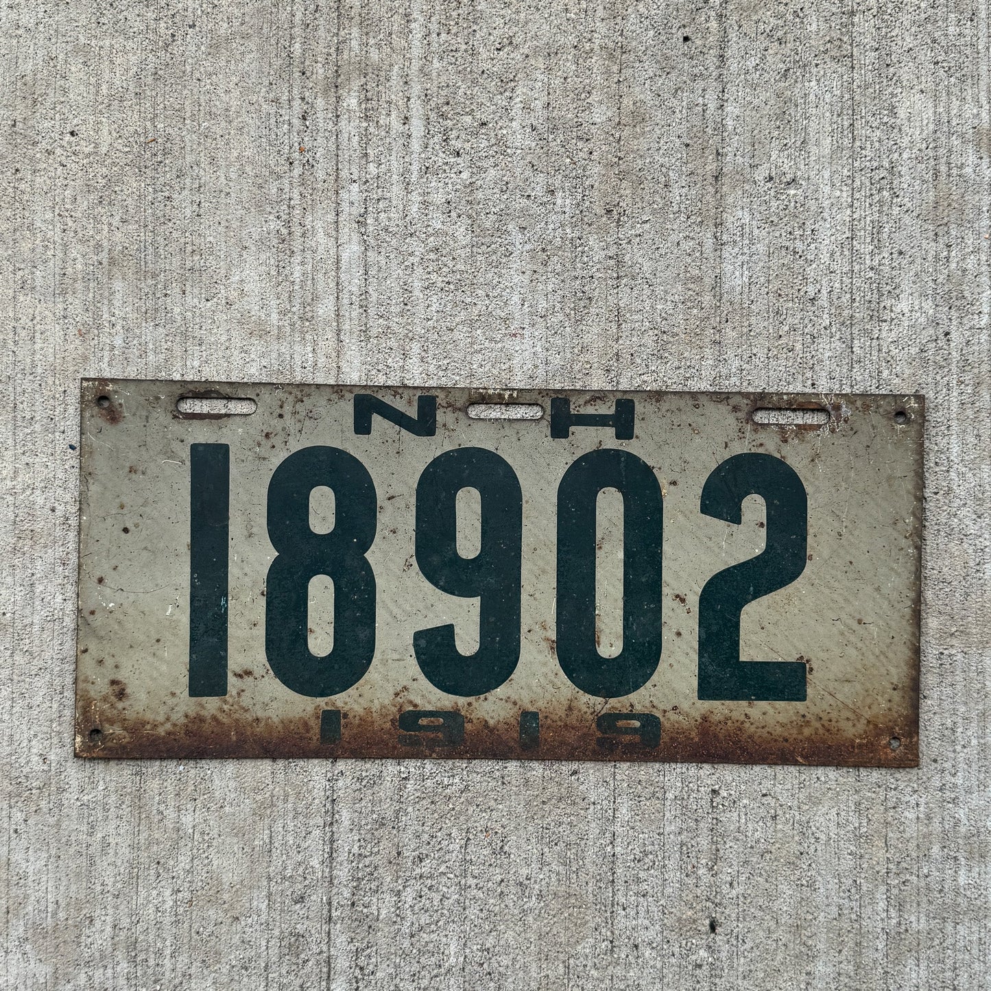 Photo of a 1919 New Hampshire License Plate Auto Tag Garage Decor Vintage 18902 with original patina