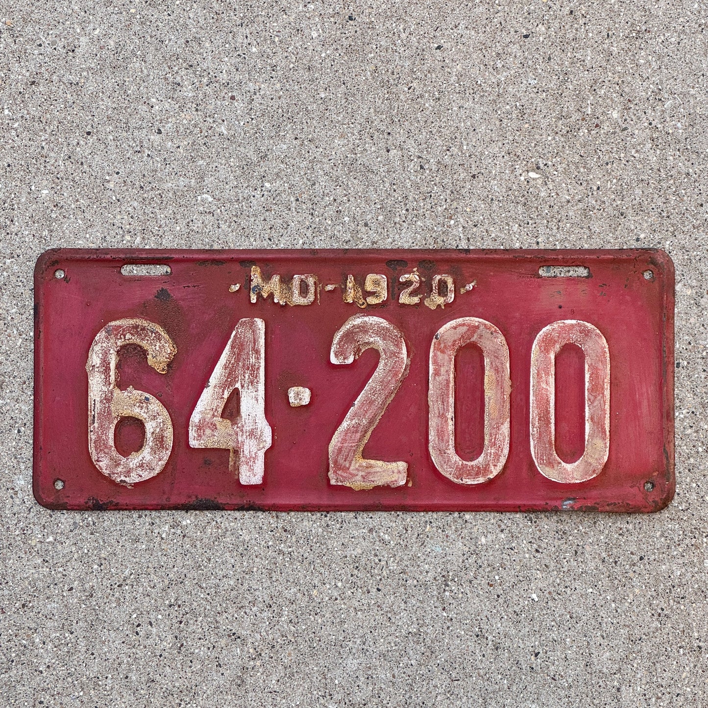 Photo of a 1920 Maryland License Plate Auto Tag Garage Decor Vintage 64 200 with original patina