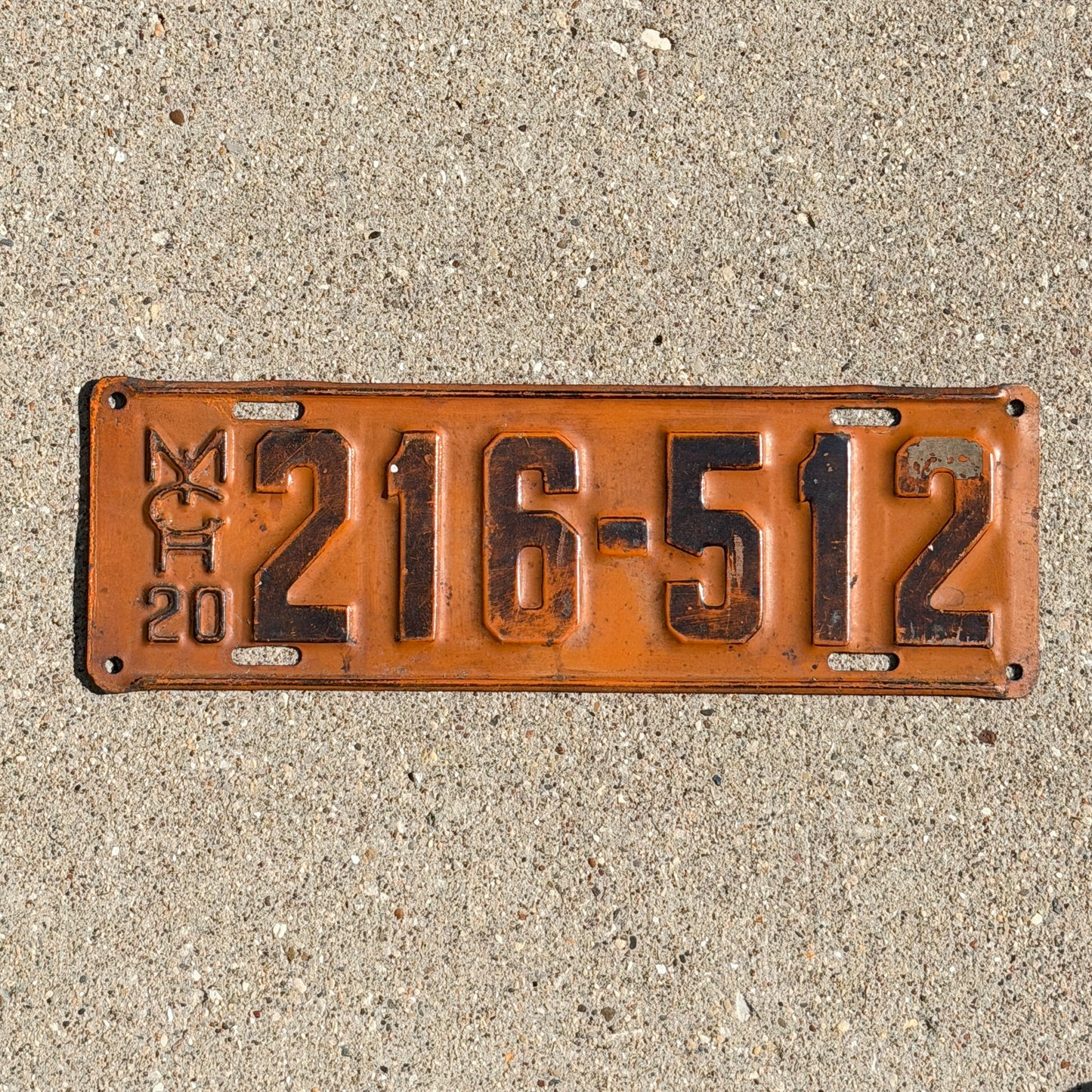 Photo of a 1920 Michigan License Plate Auto Tag Garage Decor Vintage 216 512 with original patina