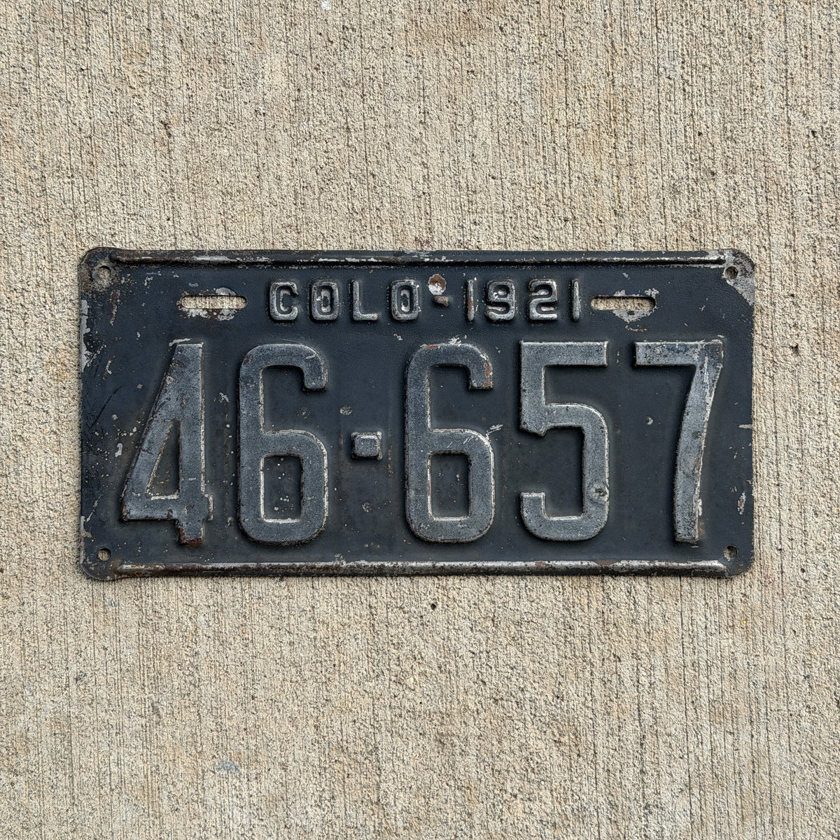 Photo of a 1921 Colorado License Plate Auto Tag Garage Decor Vintage 46 657 with original patina