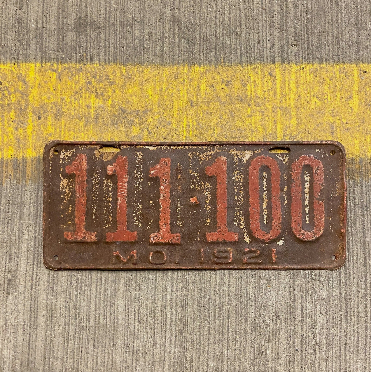 Photo of a 1921 Missouri License Plate Auto Tag Garage Decor Vintage Great Number Full House 111100 with original patina