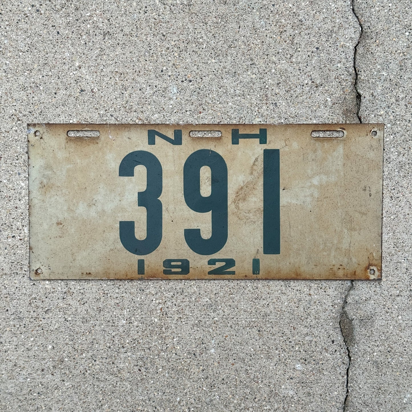 Photo of a 1921 New Hampshire License Plate Auto Tag Garage Decor Vintage Low Number Three Digit 391 with original patina