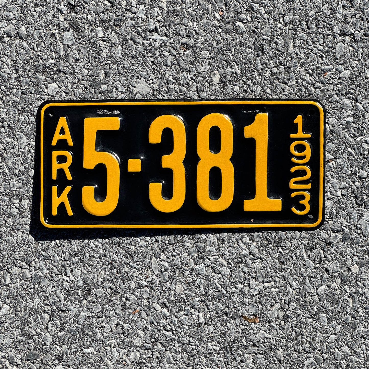 Photo of a 1923 Arkansas License Plate Auto Tag Garage Decor Vintage Four Digit Low Number 5381