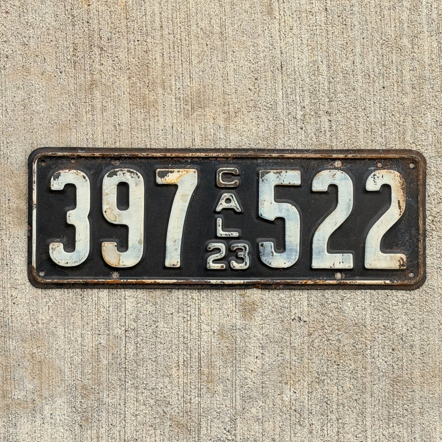 Photo of a 1923 California License Plate Auto Tag Garage Decor Vintage 397 522 with original patina
