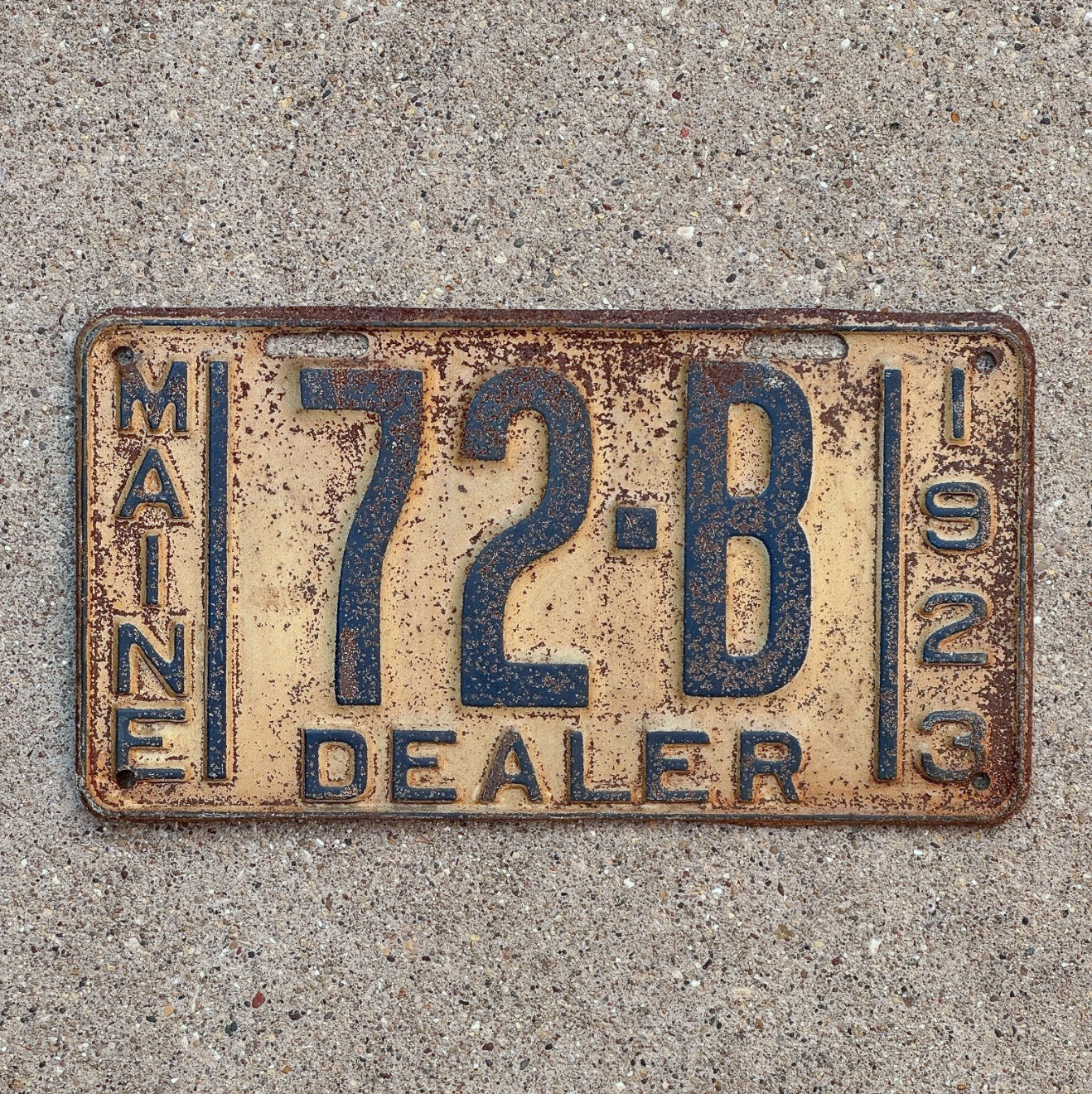 Photo of a 1923 Maine Dealer License Plate Auto Tag 1 Vintage Garage Low Number Two Digit 72 B with original patina
