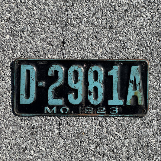Photo of a 1923 Missouri Dealer License Plate Auto Tag Garage Decor Vintage D 2981 A