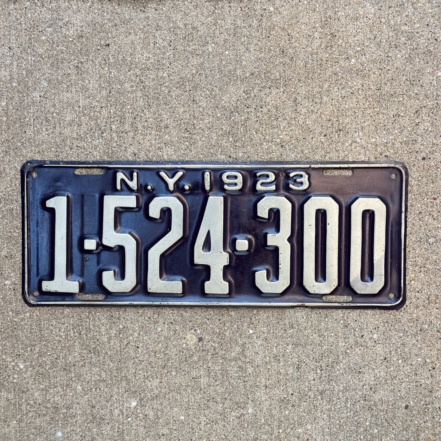 Photo of a 1923 New York License Plate Auto Tag Garage Decor Vintage High Quality, Hard to Find 7 Digit 1 524 300 with original patina