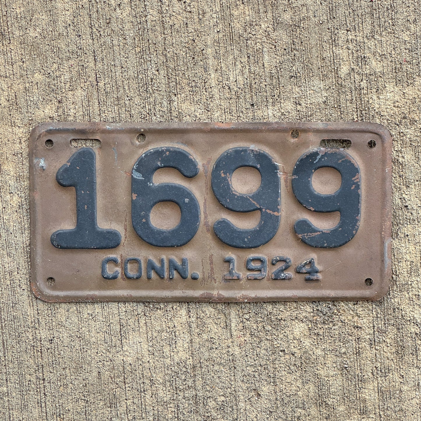Photo of a 1924 Connecticut Motorcycle License Plate Auto Tag Garage Decor Vintage 1699 with original patina