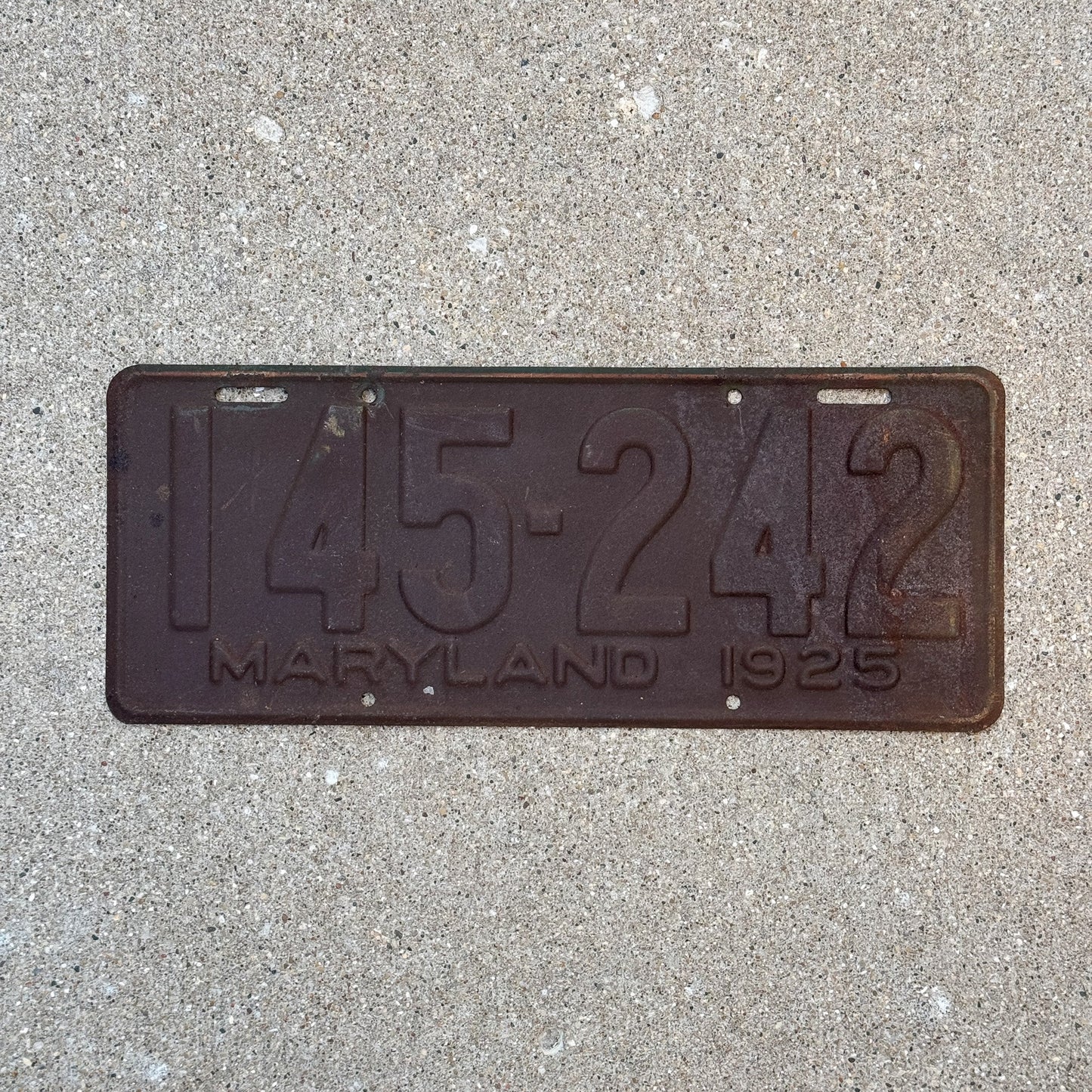 Photo of a 1925 Maryland License Plate Auto Tag Garage Decor Vintage 145 242 with original patina