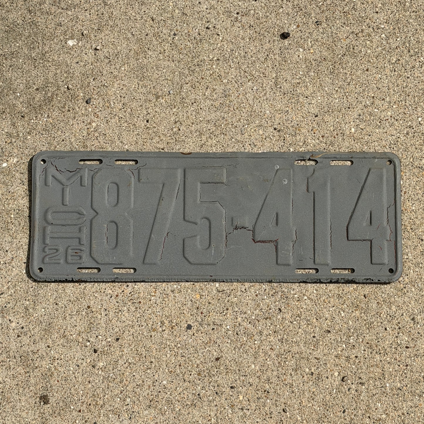 Photo of a 1926 Michigan License Plate Auto Tag Garage Decor Vintage 875 414 with original patina