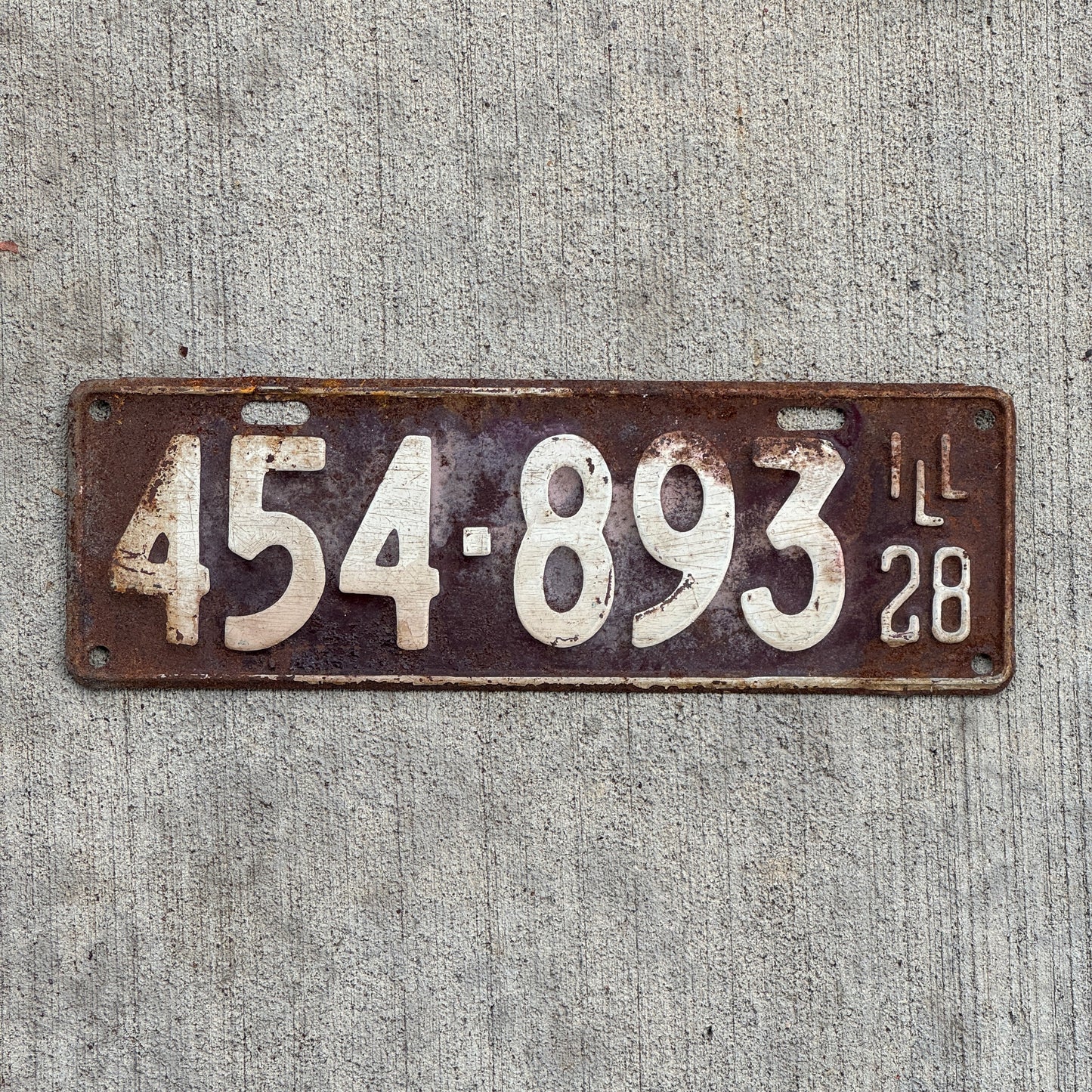 Photo of a 1928 Illinois License Plate Auto Tag Garage Decor Vintage Ford Model A Year 454 893 with original patina