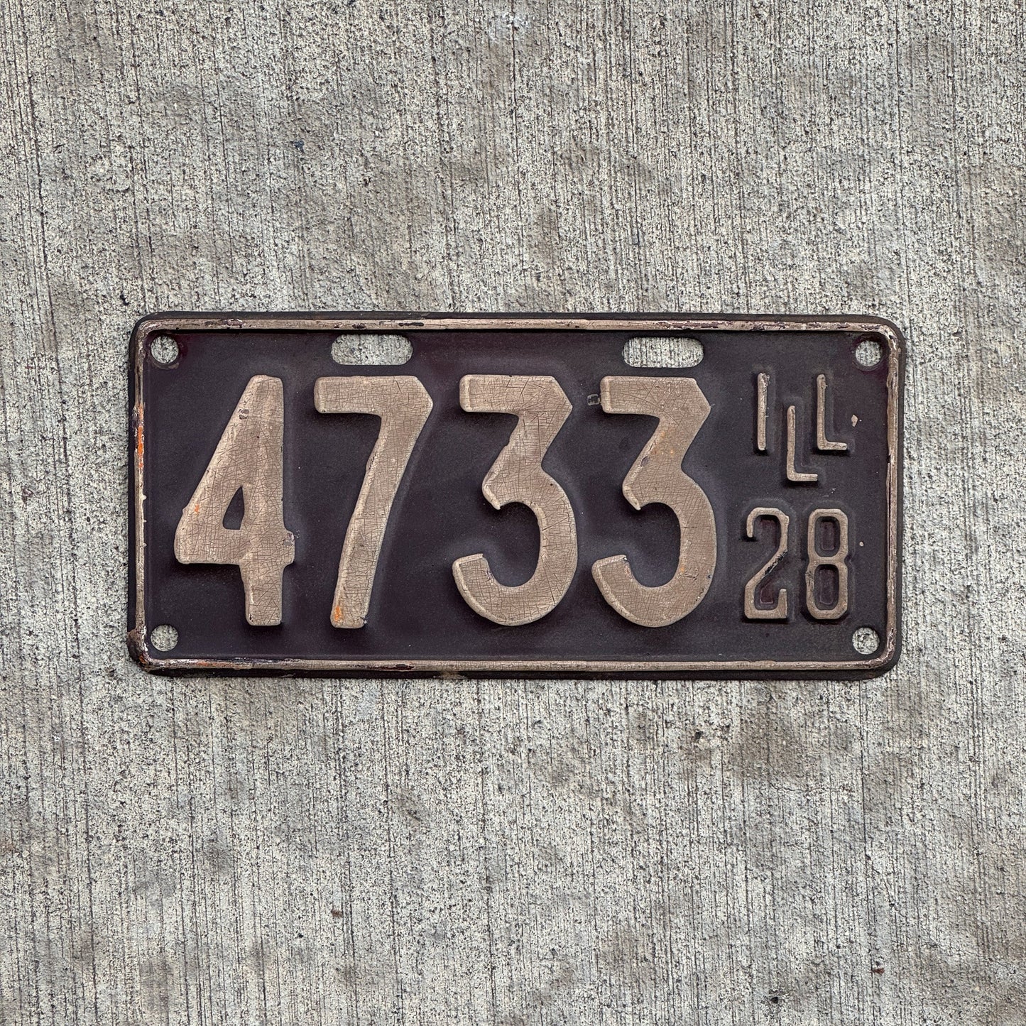 Photo of a 1928 Illinois License Plate Auto Tag Garage Decor Vintage Low Number Four Digit 4733 with original patina