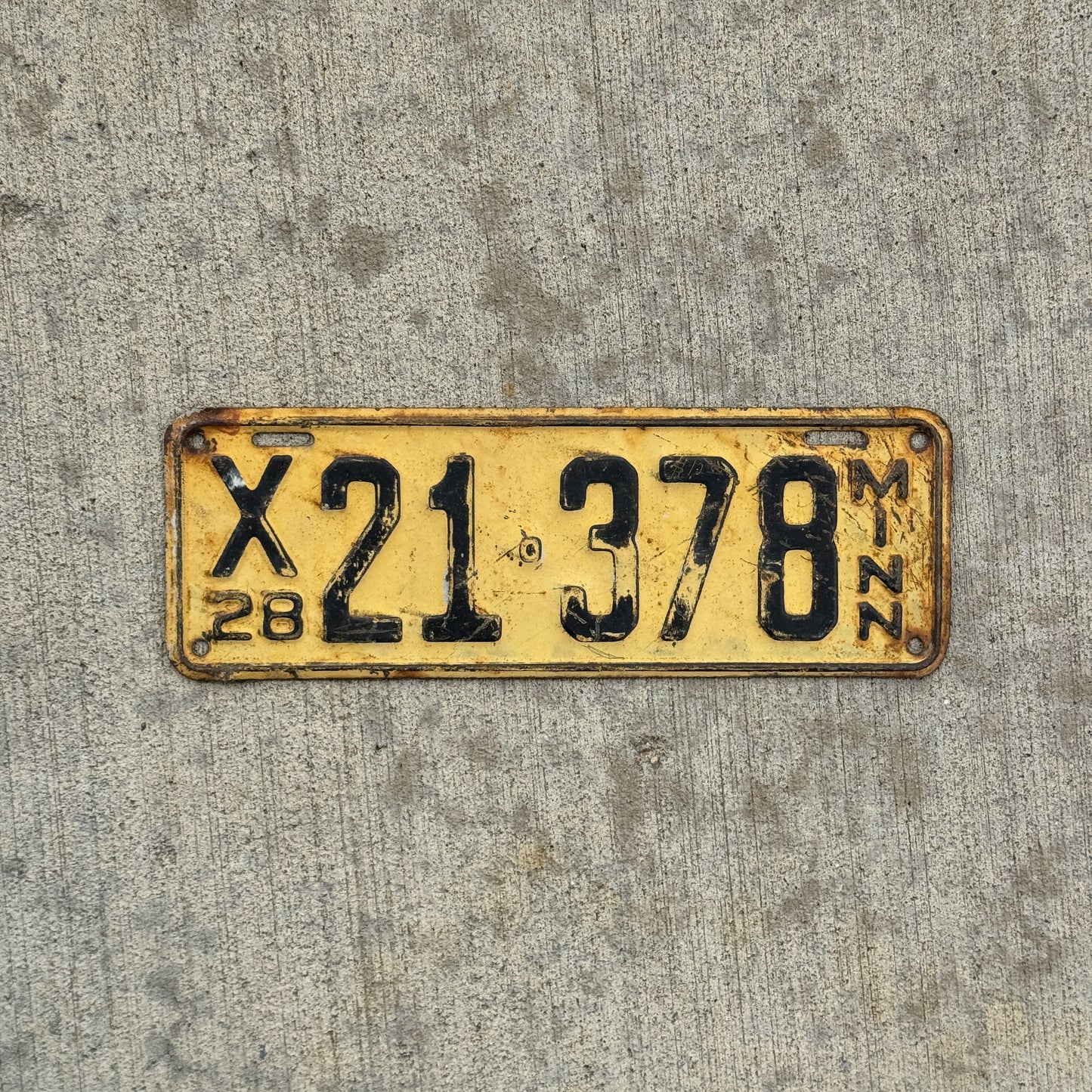 Photo of a 1928 Minnesota Truck License Plate Auto Tag Garage Decor Vintage Ford Model A Year X 21 378 with original patina
