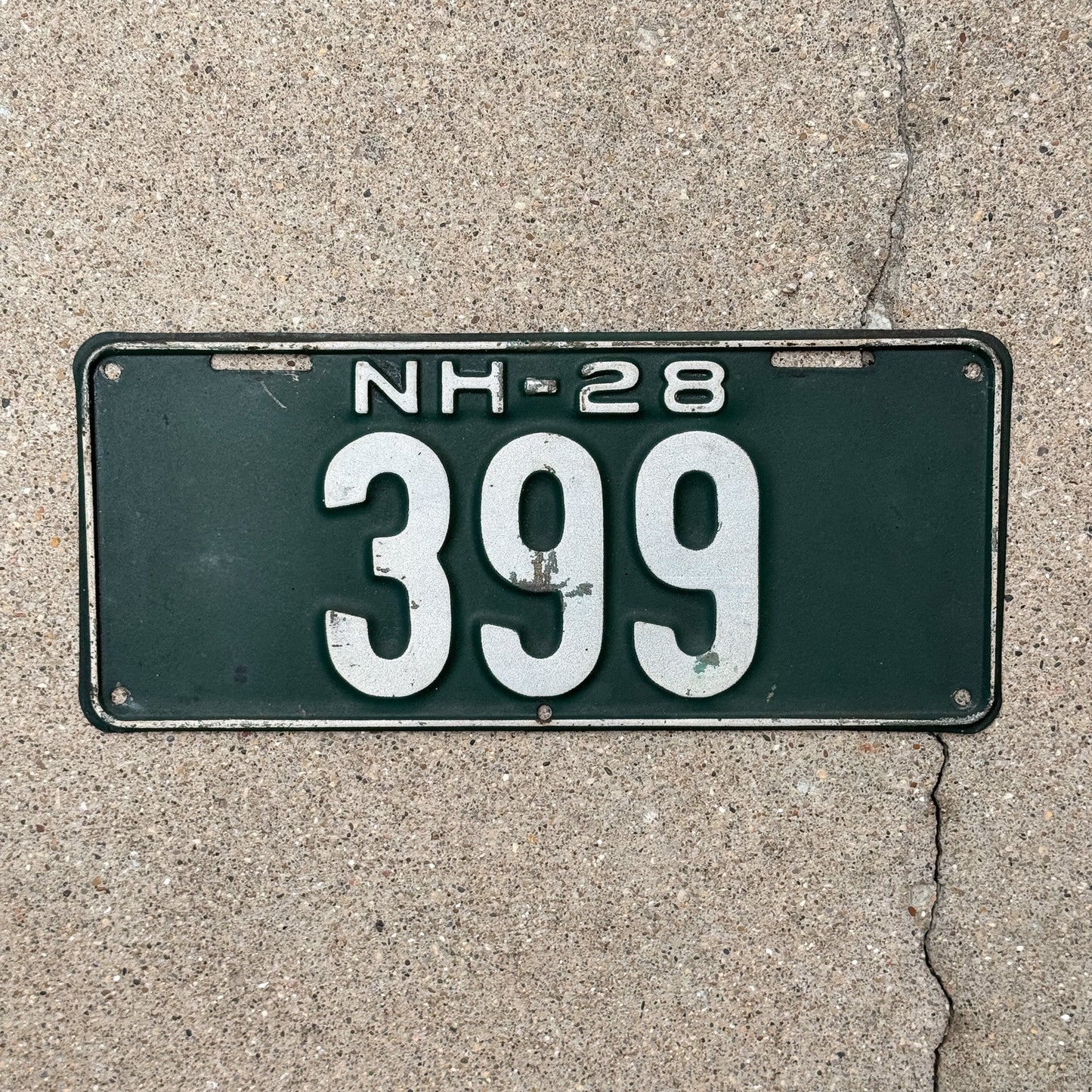 Photo of a 1928 New Hampshire License Plate Auto Tag Garage Decor Vintage Low Number Three Digit 399 with original patina