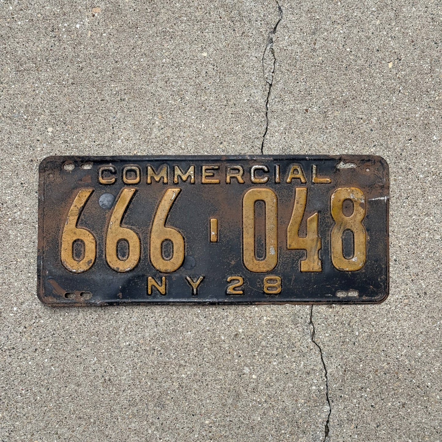 Photo of a 1928 New York COMMERCIAL License Plate Auto Tag Garage Decor Vintage Devil Evil Repeat 666 048