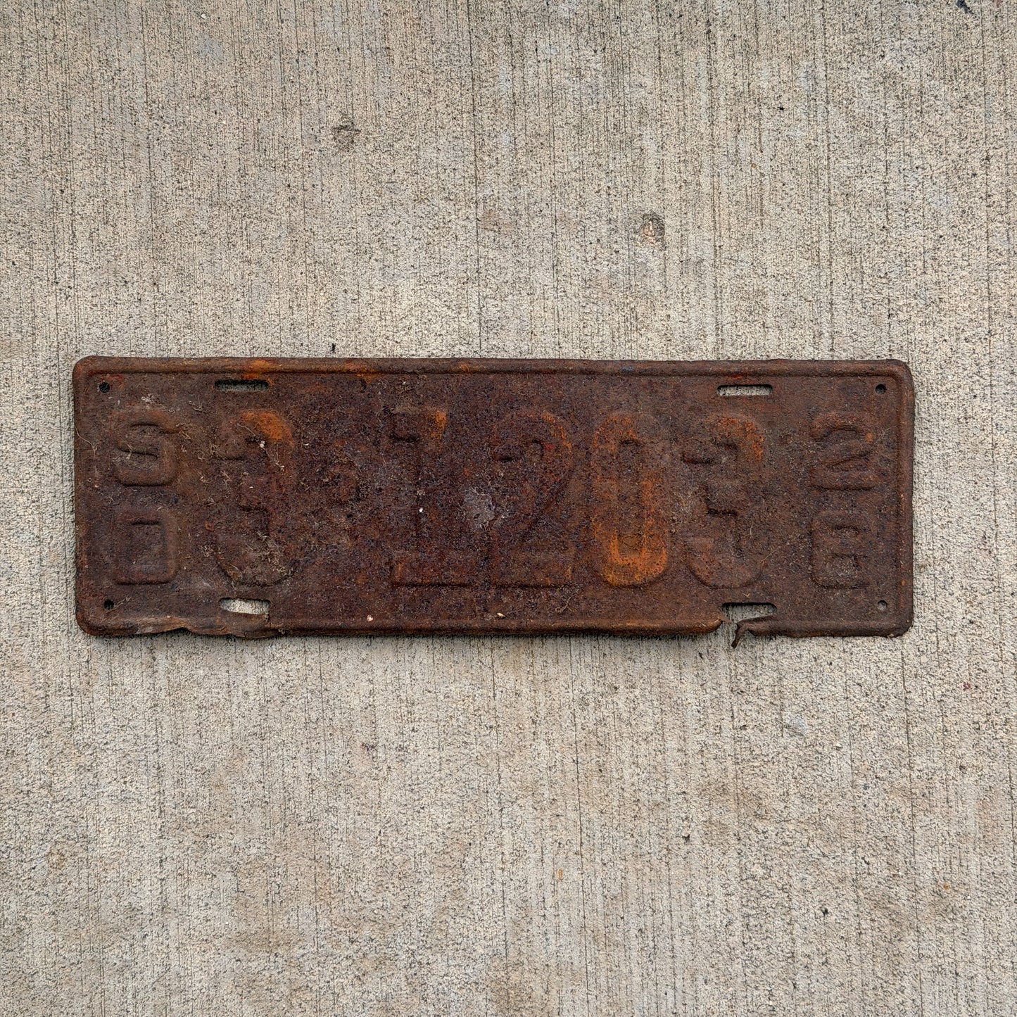 Photo of a 1928 South Dakota License Plate Auto Tag Garage Decor Vintage Ford Model A Year 3 1203 with original patina