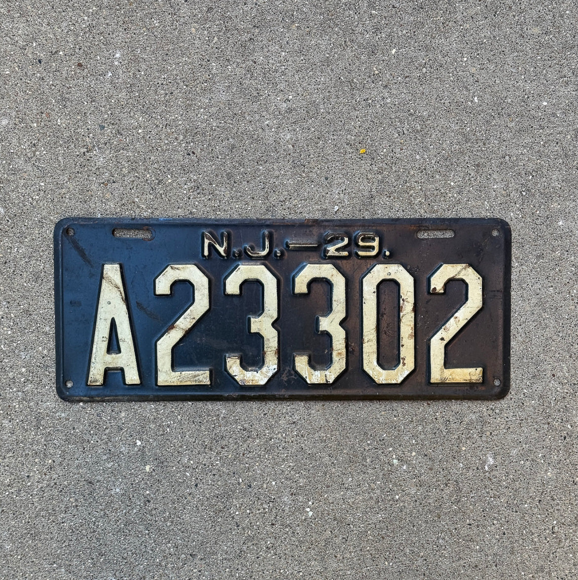 Photo of a 1929 New Jersey License Plate Auto Tag Garage Decor Vintage Ford Model A Year A 23302 with original patina