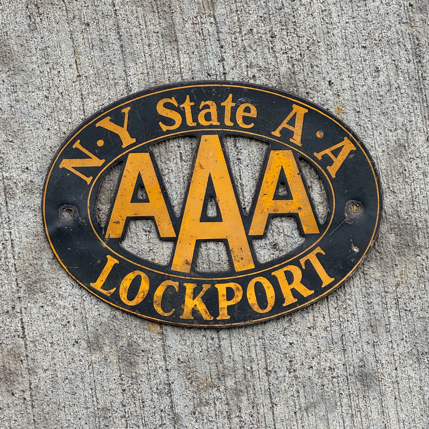 Photo of a 1930 Era Lockport New York Badge Emblem License Plate Topper Auto Tag Garage Decor Vintage AAA with original patina