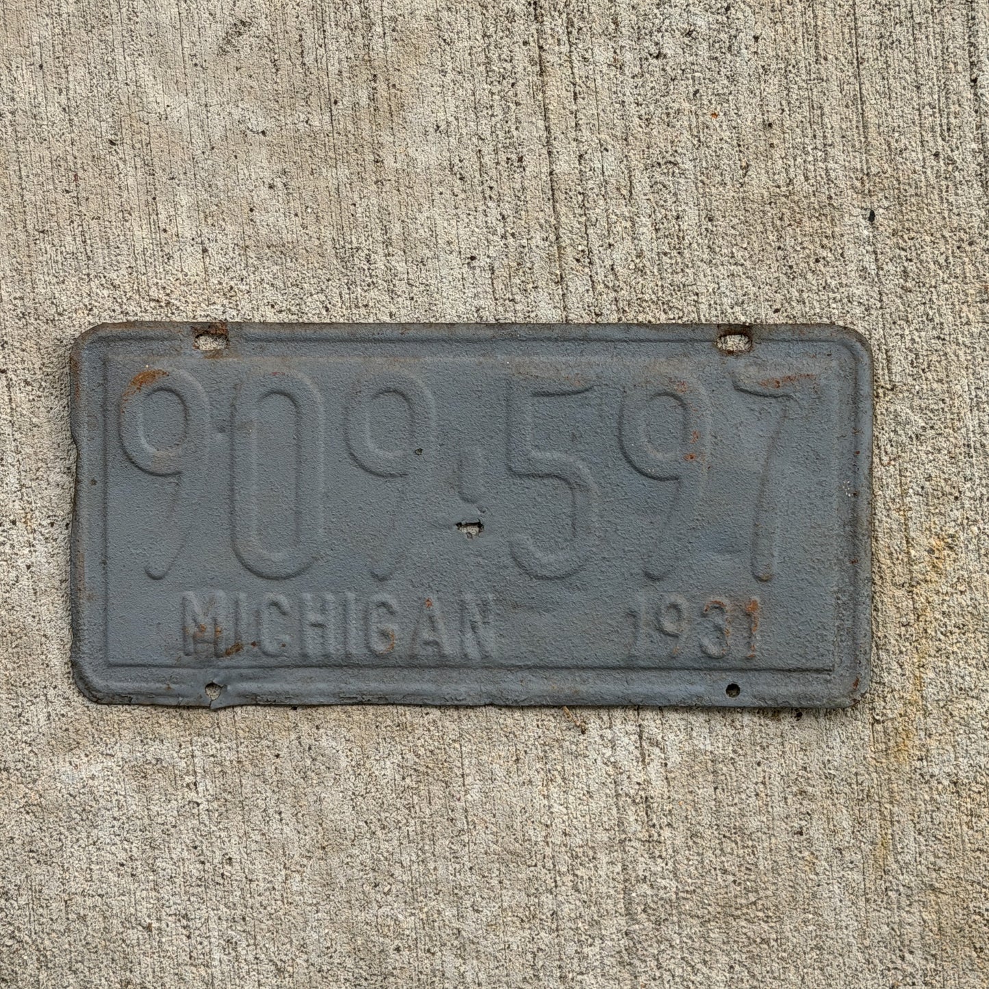 Photo of a 1931 Michigan License Plate Auto Tag Garage Decor Vintage Ford Model A Year 909 597 with original patina