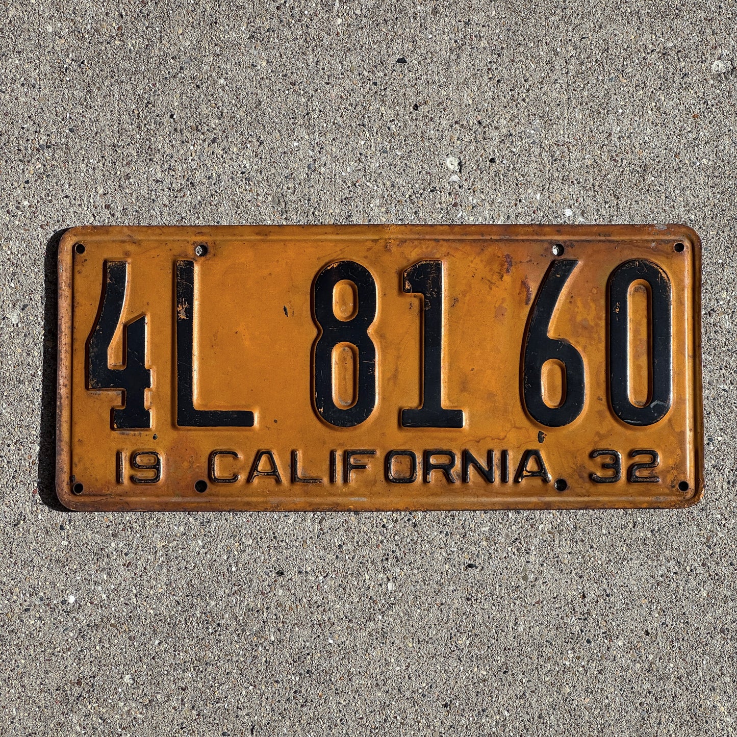 Photo of a 1932 California License Plate Auto Tag Garage Decor Vintage 4L 81 60 with original patina