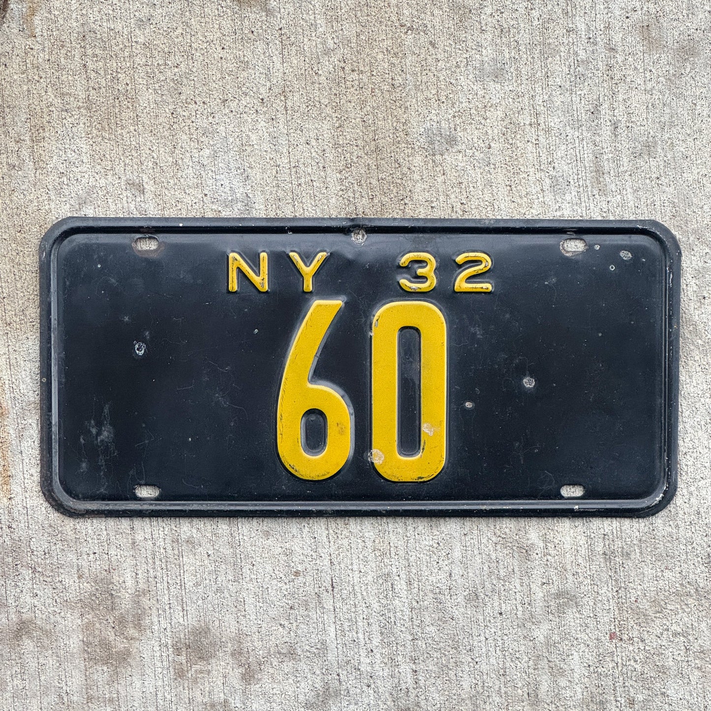 Photo of a 1932 New York Reserved License Plate Auto Tag Garage Decor Vintage ALPCA Archive Example Low Number Two Digit 60 with original patina