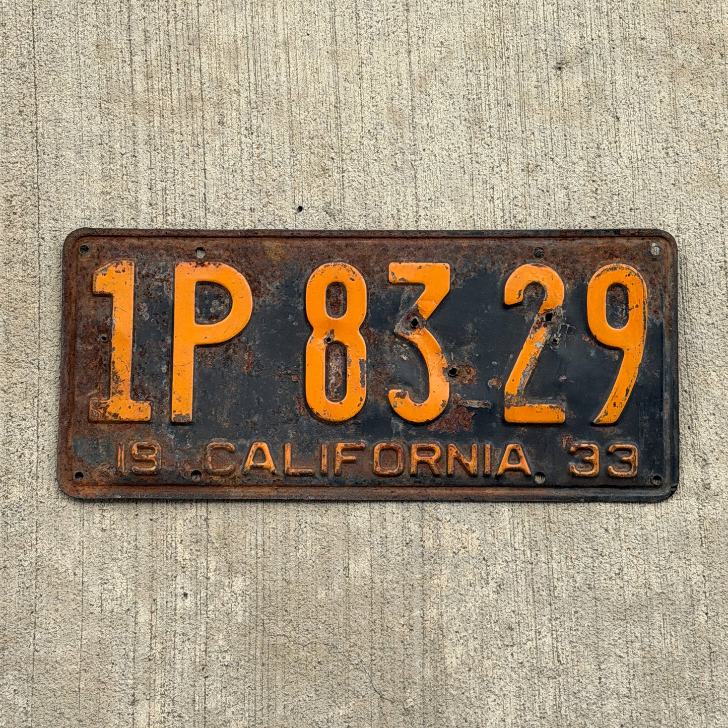 Photo of a 1933 California License Plate Auto Tag Garage Decor Vintage 1P 83 29 with original patina