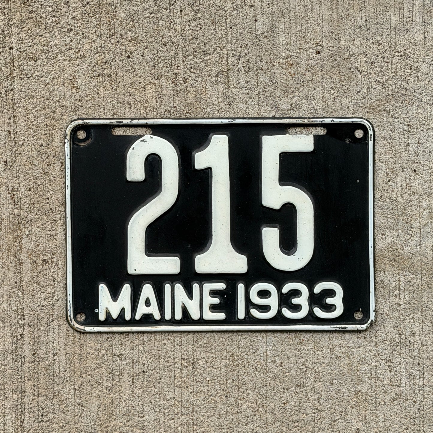 Photo of a 1933 Maine License Plate Auto Tag Garage Decor Vintage Low Number Three Digit 215 with original patina