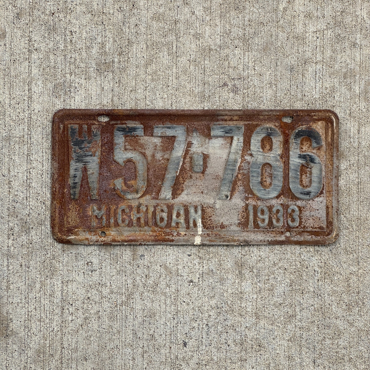 Photo of a 1933 Michigan License Plate Auto Tag Garage Decor Vintage W 57 786 with original patina