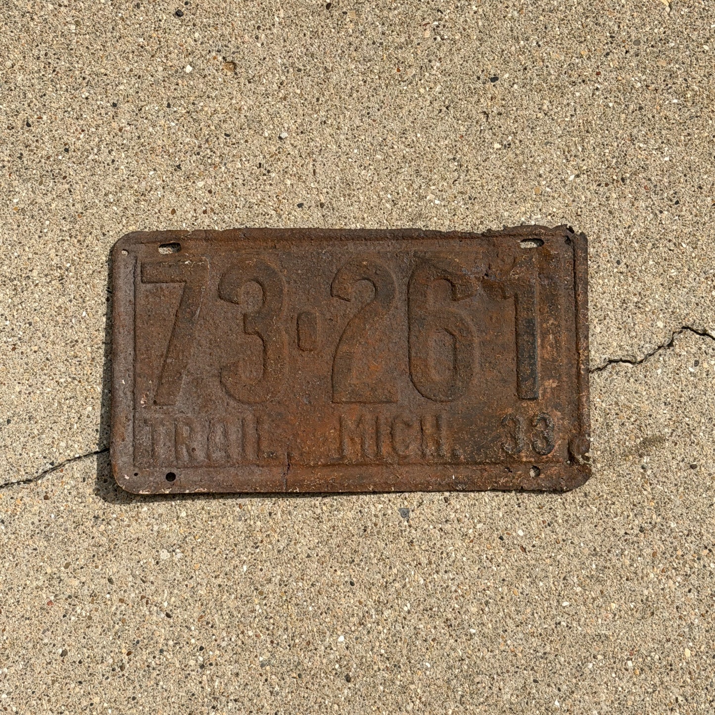 Photo of a 1933 Michigan Trailer License Plate Auto Tag Garage Decor Vintage 73 261 with original patina