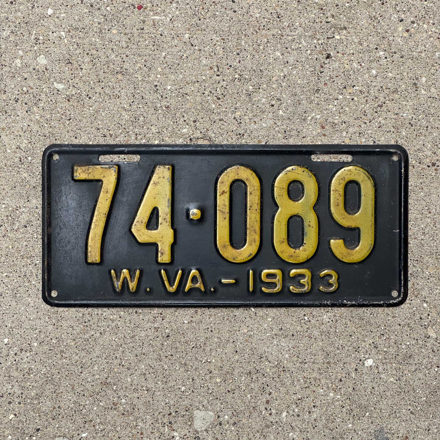 Photo of a 1933 West Virginia License Plate Auto Tag Garage Decor Vintage 74 089 with original patina