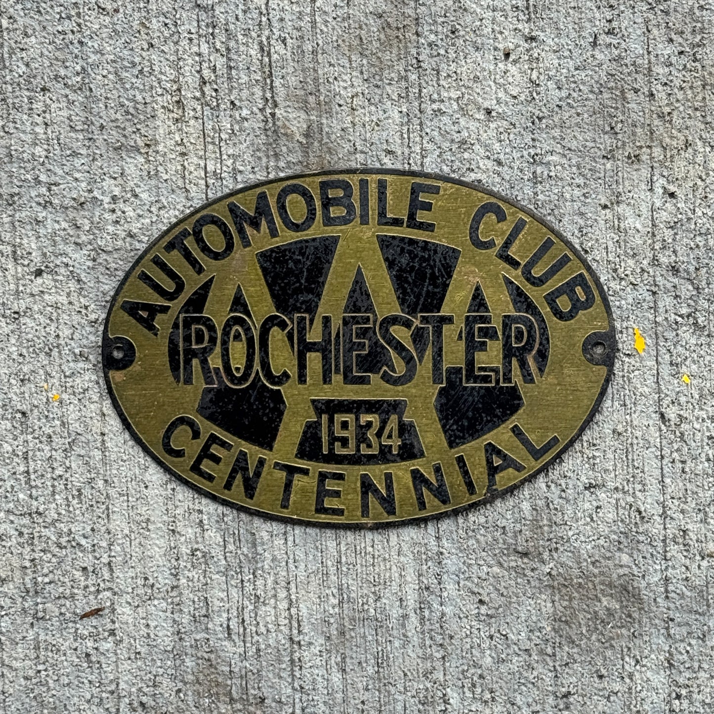 Photo of a 1934 Rochester New York Badge Emblem License Plate Topper Auto Tag Garage Decor Vintage AAA Centennial with original patina