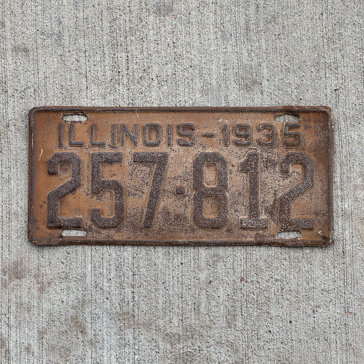 Photo of a 1935 Illinois License Plate Auto Tag Garage Decor Vintage 257 812 with original patina