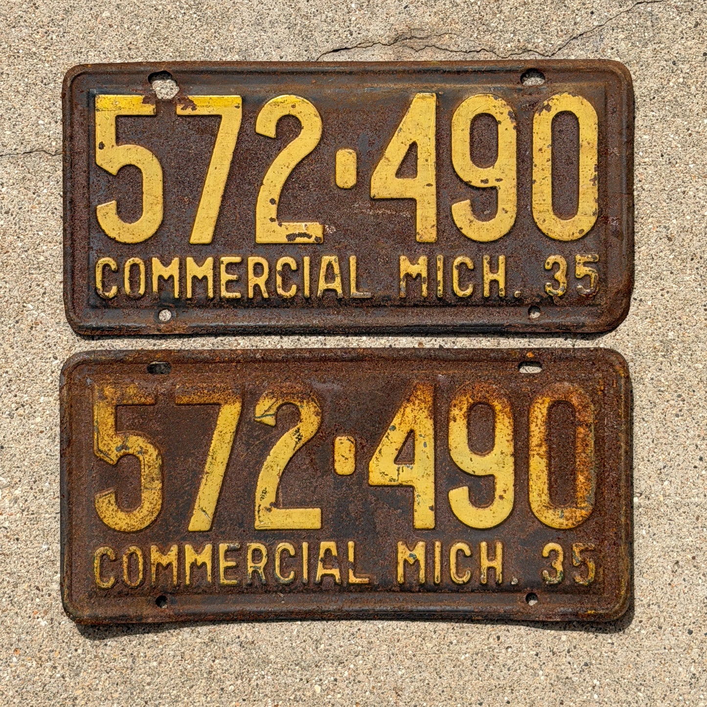 Photo of a 1935 Michigan Commercial License Plate Pair Auto Tag Garage Decor Vintage 572 490 with original patina